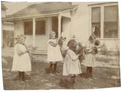 J.M. Robinson daughters playing musical instruments