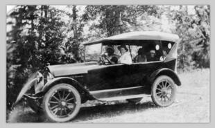 Charles and Maud Hoover and the Overland Car with two seats