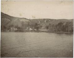 [J.M. Robinson house on shore of lake]