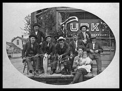 Group of men in front of Turk's Head Saloon