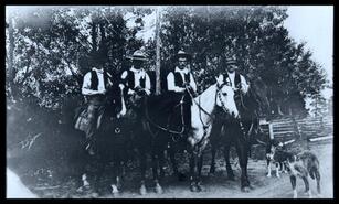 Norman, Fred and Clarence Woodward with ? Jackson on horseback