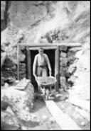 Man with wheelbarrow at Kal gold mine