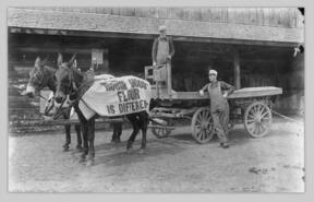Men with mule team and wagon at warehouse on Pleasant Valley Blvd.