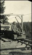 Man sitting on motor, Granby Mine, Phoenix
