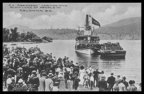 S.S. Aberdeen arriving with scow-load of people at Kelowna, B.C.