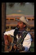 Cowboy Dave Longworth performing poetry at O'Keefe Ranch