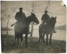J.M. Robinson on horseback