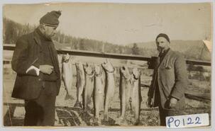 Oly and Alex Miller with catch of Kamloops rainbow trout, ca. 1909