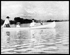 Sam King, aunt Bert Maryam, Louise, and Dorothy Rae in canoe