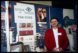 Marcel Ahmadzahdegan with Mona Vision display at trade show