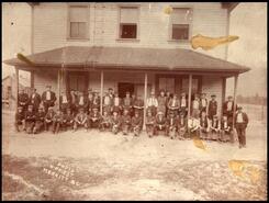Coal miners in front of bunk house (first Grand Hotel), Middlesboro