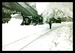Plow #401022 and spreader being pushed by engine #5922, unknown location