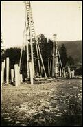 Log towers for gypsum mine aerial tram line