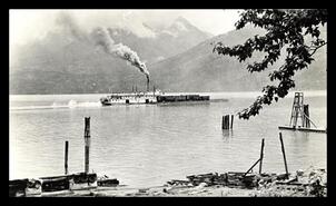 S.S. Moyie with barge in Kaslo Bay