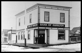Jim Campbell, Murdock McKay and unidentified man in front of Bank of Hamilton