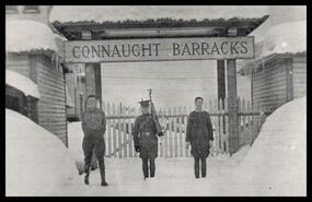 Unidentified soldiers standing in front of Connaught barracks