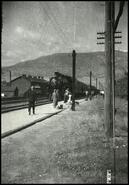 [C.P.R. train and passengers at Penticton station]
