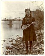 Unidentified young girl on the banks of the Granby River