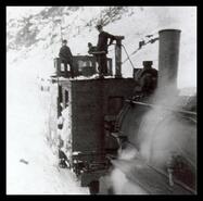 Train at snow slide at the Lucky Jim Mine and Rambler siding