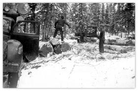 Shortie Long and Alvin Edge loading logging truck on Burr Mountain