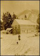 Mrs. Samuel Brewer in front of the Fairmont Road House