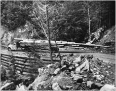 Baird Bros. logging truck on Cook Creek Road at Angel Creek Falls