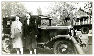 Edna and Jessie Stuart in front of their old Ford car