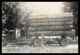Bill Mackey in loaded logging truck