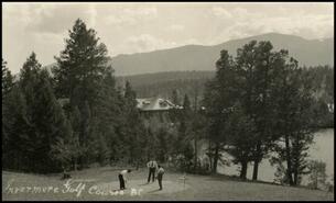 Three men playing golf at Invermere Golf Course