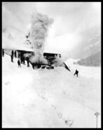 Clearing C.P.R. snow shed entrance at Rogers Pass