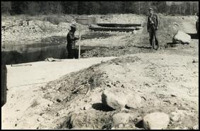 [Men working on Penticton Creek]