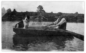 Bob MacTavish and his dog Jack on the pond