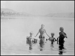 Elizabeth Armstrong with children swimming at Kalamalka Lake