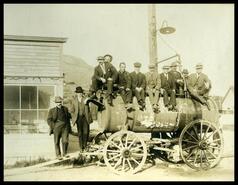Group on a water wagon used by the Grand Forks City Works Department