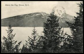 Postcard entitled " Above the fog, Slocan, B.C."
