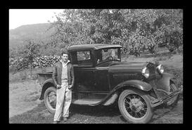 Mac Dewar standing beside his 1931 Model A Ford truck, Oyama