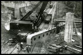 Railway at 19 Mile, erecting structural steel for bridge