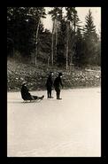 Eric Paterson and others with skates and sled, Mirror Lake