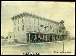 Oriental Hotel, with Number One Fire Hall at end of block, Farwell