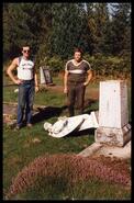 Keith Bramhill and Howard Graham inspecting vandalism at Revelstoke cemetery