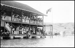 Crowd watching a diving competition at the Kalamalka Lake Country Club