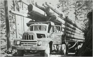 Truck loaded with poles from Sicamous Creek