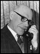 Norman Spackman using the telephone