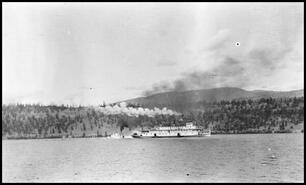 S.S. Okanagan sternwheeler and the S.S. York passing on Okanagan Lake