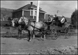 Henry Hendrickson's horse team and wagon with four men