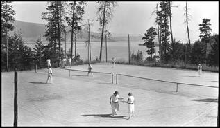People on the tennis courts at Ewings Landing