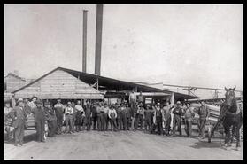 Group of mine workers outside the sawmill at Granby smelter