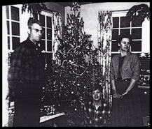 Arlie and Anna Chambers with Christmas tree