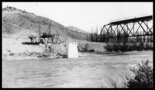 Ashcroft's 4th bridge construction with 160 foot span overhanging the river
