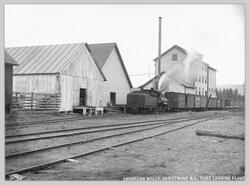 Rail cars loading flour at Okanagan Flour Mill